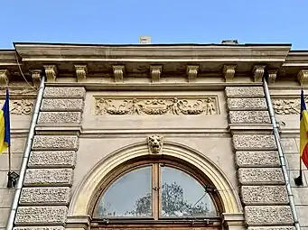 Neoclassical relief with putti and festoons on the Dimitrie Sturdza House (Strada Arthur Verona no. 13-15), Bucharest, Romania, 1883, unknown architect