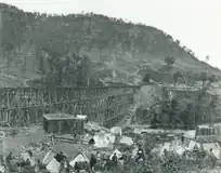 1 1864 US Military Railroads bridge across Running Water creek near Whiteside, Tenn. Four-tiered, 780-foot-long railroad trestle bridge built by the 1st Michigan Engineers with guard camp also shown.