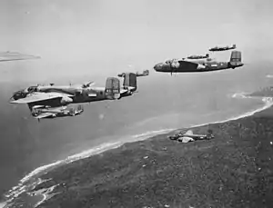 Image 38B-25 Mitchell bombers from No. 18 (NEI) Squadron near Darwin in 1943. This was one of three joint Australian-Dutch squadrons formed during the war. (from Military history of Australia during World War II)