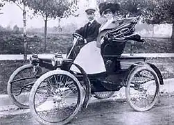 George Dorris and his  wife in a 1901 St. Louis runabout