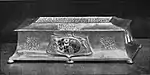 Black and white photograph of a casket