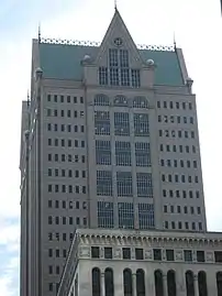 The building's gabled roof is a reference to the demolished Masonic Temple Building