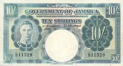 Light blue coloured banknote showing image of George VI