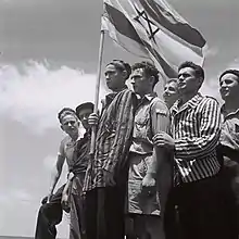 Image 13Buchenwald survivors arrive in Haifa to be arrested by the British, 15 July 1945 (from History of Israel)