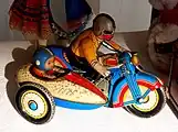 Image 18Motorcycle clubs became more prominent in the 1950s. Pictured is a vintage 1950s motorcycle toy.  (from 1950s)