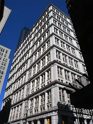 AT&T's previous headquarters at 195 Broadway, a classical-style structure with a white granite facade, as seen from the street level