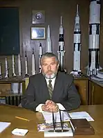 Still with his rocket models, von Braun is pictured in his new office at NASA headquarters in 1970