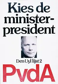 At the top of the election poster it says in Dutch: "Elect the Prime Minister". Below this is a small image of Den Uyl with the text "Den Uyl list 2". At the bottom it says "PvdA" in red.