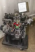 1990 GM Iron Duke engine with parts cut away to reveal the inner arrangement