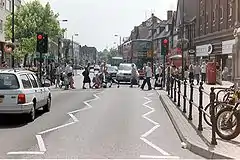 Urban street with cars and crosswalk