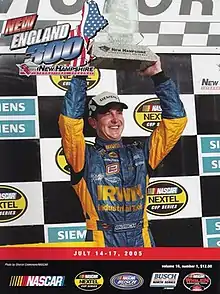 The 2005 New England 300 program cover, featuring Kurt Busch, winner of the 2004 race.