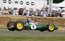 Prior to commercial sponsorship, Lotus cars ran in a livery of British racing green. This is a Lotus 33 being demonstrated at the 2006 Goodwood Festival of Speed.