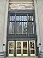 London Guarantee Building with large relief above the entrance commemorating Fort Dearborn