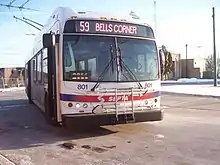 alt3=On the roof of the trackless trolley two poles rise up to contact overhead wires.