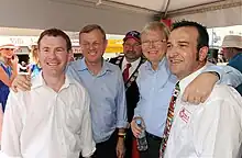 Five men standing