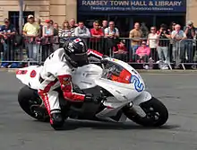 2013 Isle of Man TT  TT Zero – Mark Miller(2) MotoCzysz E1pc Practice Session – Parliament Square, Ramsey 3 June 2013.