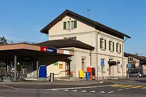 Three-story cream-colored building