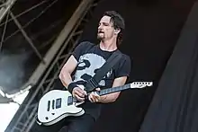 Joe Duplantier playing his custom guitar in 2017