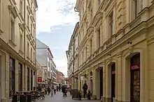 street, with historic buildings on either side