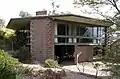 House in Red Hill, Australian Capital Territory, designed by Robin Boyd. Typical of the post-war Melbourne regional style: long unbroken roof line, wide eaves, extensive windows.