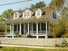 Dorgan Cottage, a Creole cottage built in 1860 at 22 South Lafayette Street