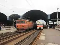 Mid-afternoon at Skopje. On the left, 441.107 on the daytime service from Beograd to Thessaloniki which sits at Skopje for about half an hour. On the right, DMU on a late departing service to Kičevo., April 2010.