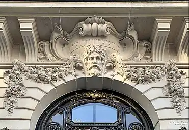 Beaux Arts mascaron with festoons on Rue de la Paix no. 23, Paris, unknown architect, 1908