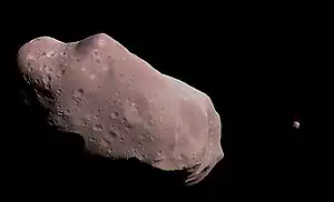 Galileo image of 243 Ida (the dot to the right is its moon Dactyl)