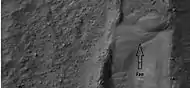 Small, well-formed alluvial fan, as seen by HiRISE under HiWish program. Location of this fan is shown in an image displayed above. Water is involved with fan formation.