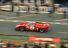 Lola T70 MK III B of Bonnier/Gregory, passing the pits during the race