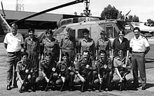 Members of 25 Squadron on a training exercise in 1991 at RAAF Base Pearce with A2-509 of 5 Squadron.