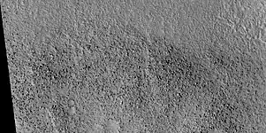 Boulders that were picked up, carried, and dropped by tsunamis, as seen by HiRISE tsunamis were probably caused by asteroids striking ocean.  Boulders are between the size of cars and houses.