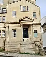 Photograph of 31 Berkeley Square. The building is now used as an arts and media office space and a car park for the Berkeley Square Hotel.