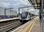 Transport for London Rail Class 345 passes West Ealing Station.