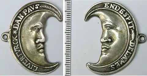 Half-moon medal