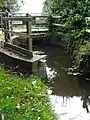 Gauging station on the River Mun at Mundesley Hospital.