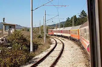 The Balkan Express departing Dragoman with a BDŽ Class 44 locomotive pulling.