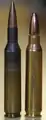 XL1E1 cartridge on the left and a .223 Remington cartridge on the right