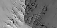 Close view of layers in Louros Valles, as seen by HiRISE under HiWish program  Note this is an enlargement of a previous image.