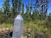 The obelisk as seen from the Manitoba (southeast) side, with a survey tower in the territories