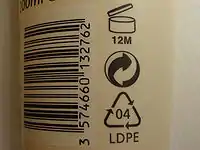 PAO symbol, along with the Green Dot symbol and resin identification code on a bottle of lotion.