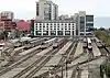 View of an urban railroad terminal station with six island platforms