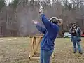 The recoil from the .500 Linebaugh cartridge inducing significant muzzle rise during firing a Ruger Bisley revolver.