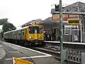 A Merseyrail Class 507 unit waits with a service to Liverpool.