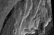 Close view of layers, as seen by HiRISE under HiWish program  Rectangle shows the size of a football field for scale.