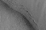 Close view of pits, as seen by HiRISE, under the HiWish program