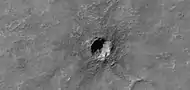 Small crater, as seen by HiRISE under HiWish program  Much of the ejecta consists of boulders.