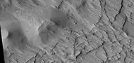 Close view of contact between ridge network and overlying layer,  as seen by HiRISE under HiWish program