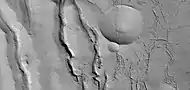 Close view of cracks of various sizes, as seen by HiRISE under HiWish program  Ice disappears along crack surfaces and makes crack larger.