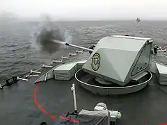 Bofors 57/70 Mark 2 firing from a Canadian Halifax-class frigate.